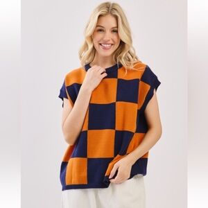 090. Varsity checkered sweater in blue and orange